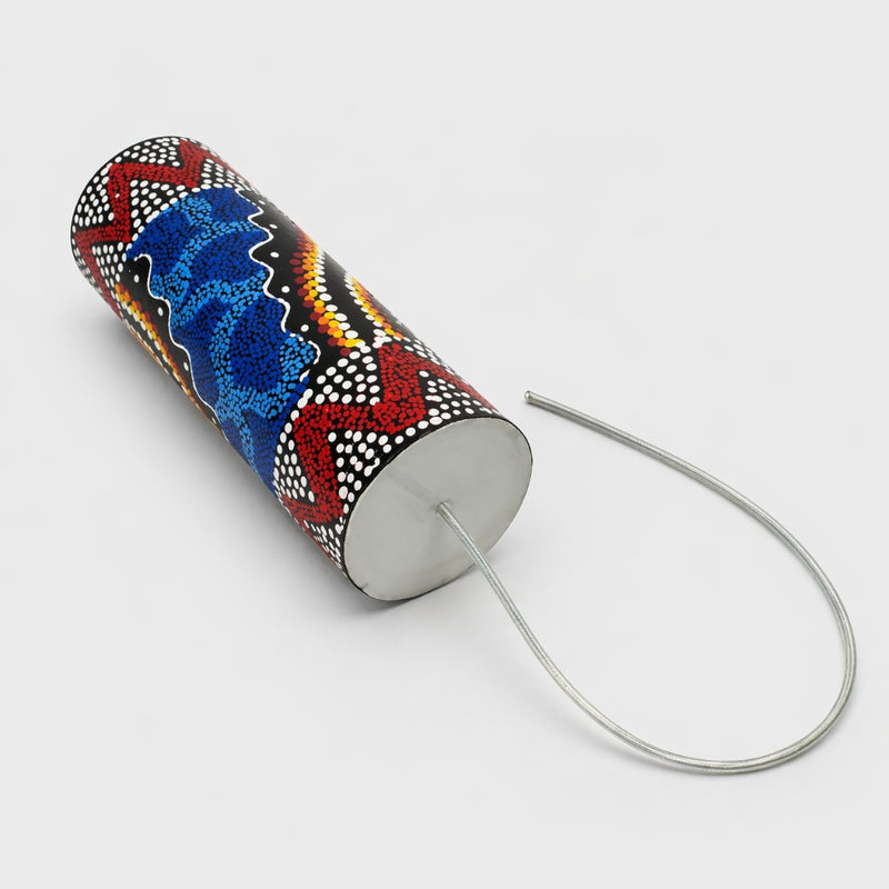 Balinese painted thunder drum on grey background 