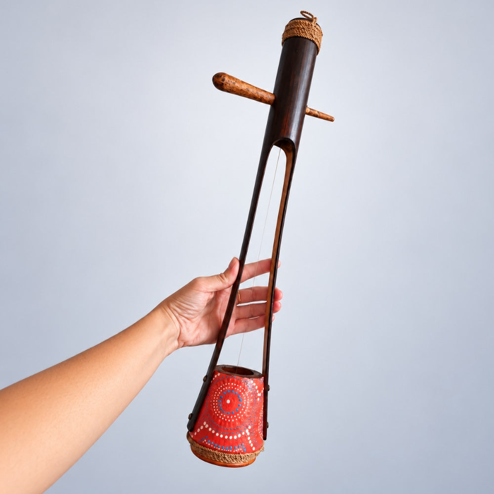 hand holding gobijue instrument 