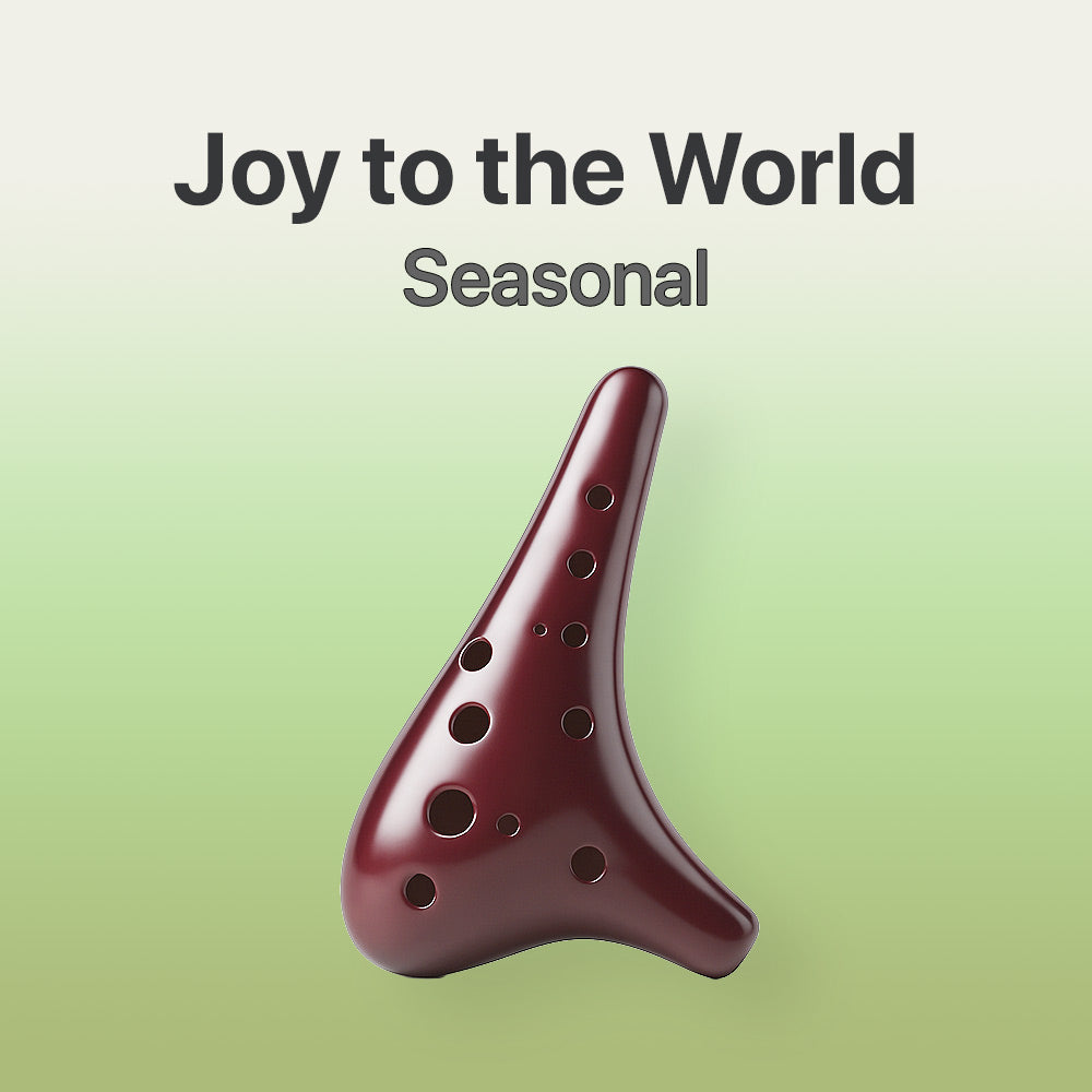 Red ocarina on a green background with 'Joy to the World Seasonal' text.