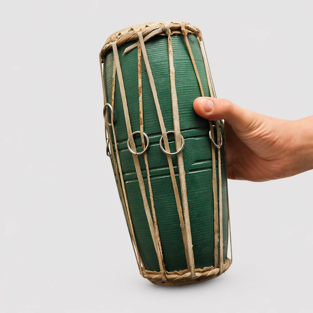 madal drum in hand