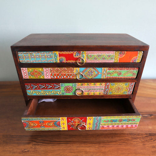 Sustainable dark mango wood chest with open drawer