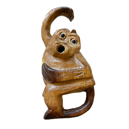 close up of wooden monkey flute