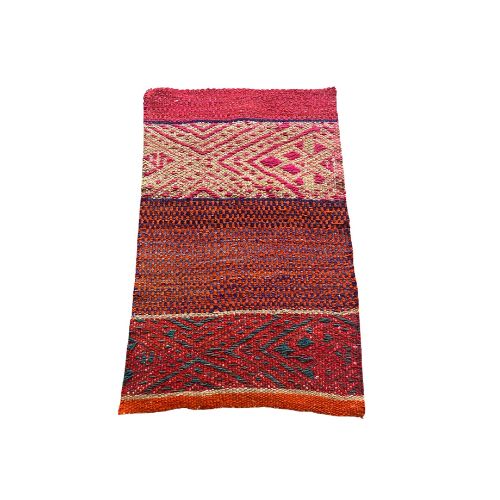 Peruvian wool rug with geometric design pink hues