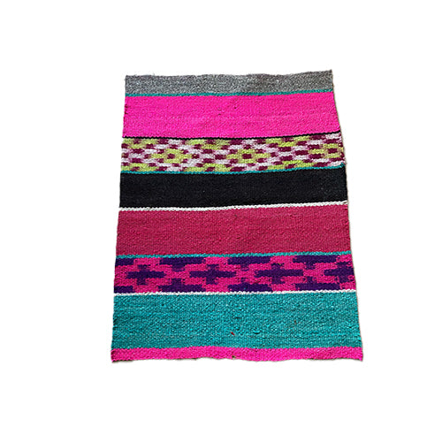 Small handmade Peruvian rug with pink stripes