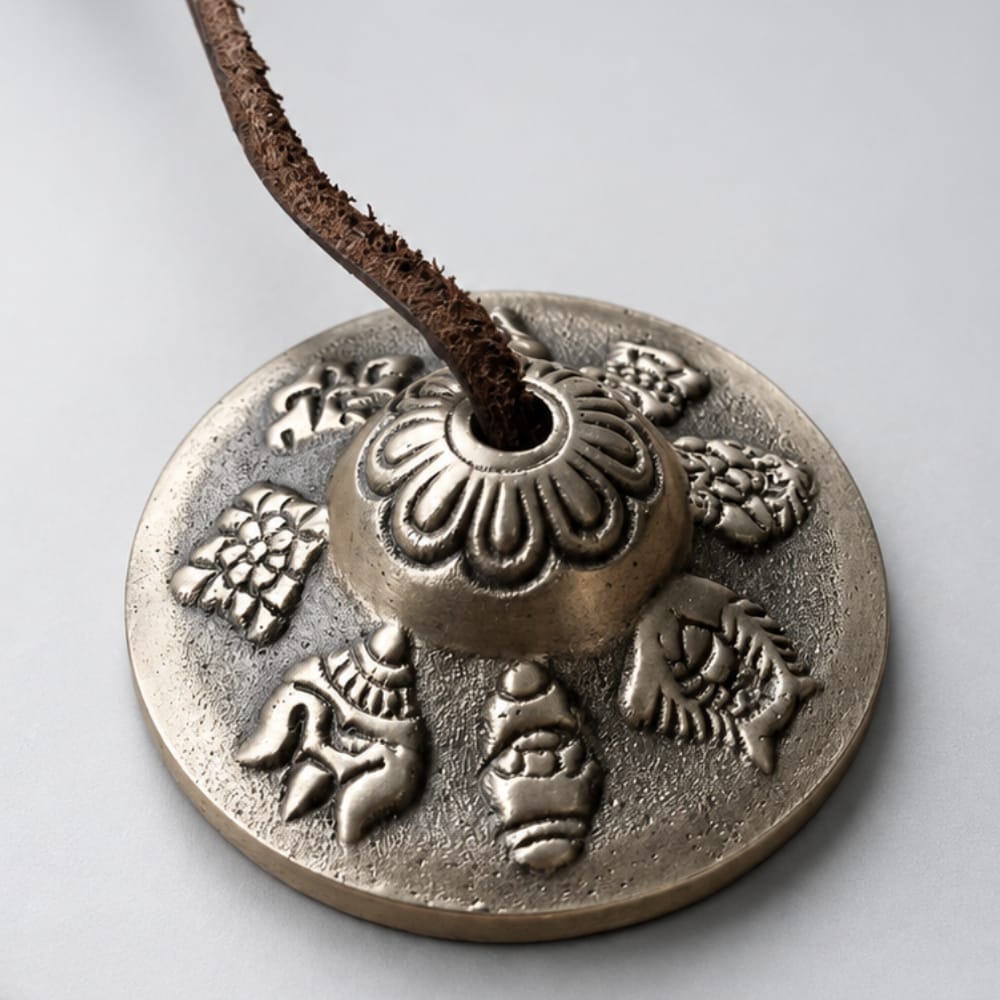 close up of tingsha bells