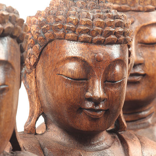 carved Balian wooden Buddha faces