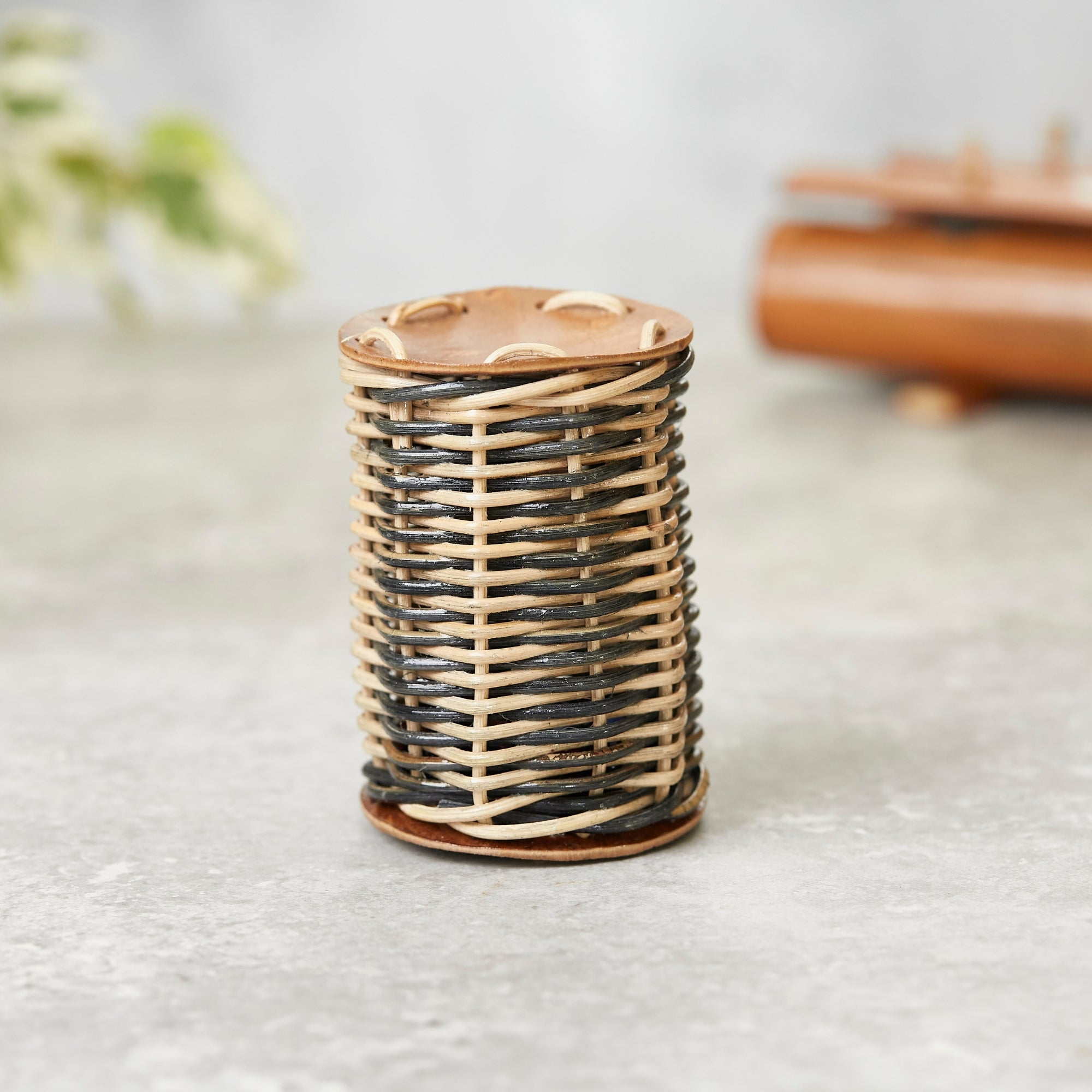 Upright caxixi woven tin shaker from indonesia