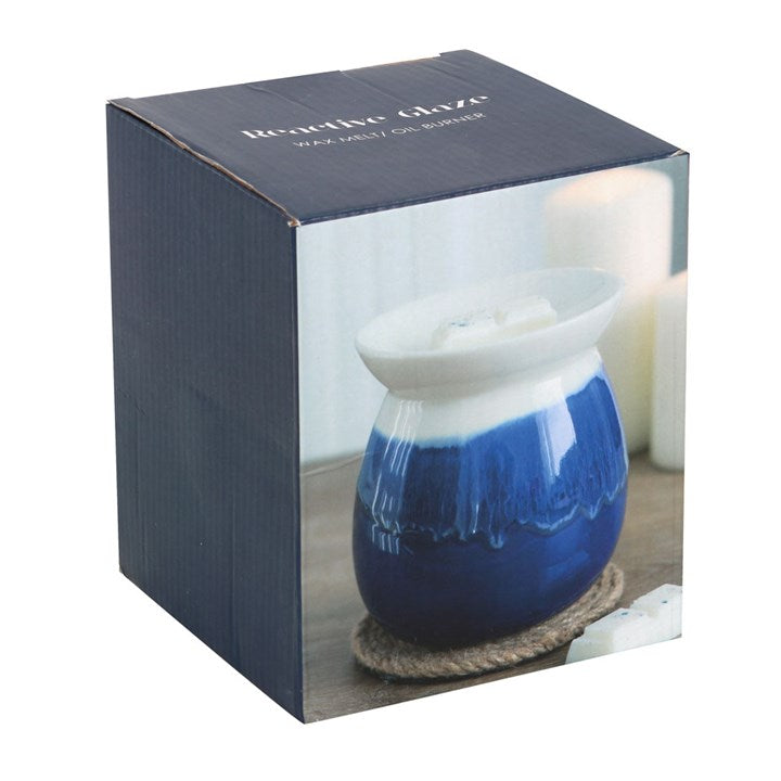 box of blue glazed ceramic oil burner