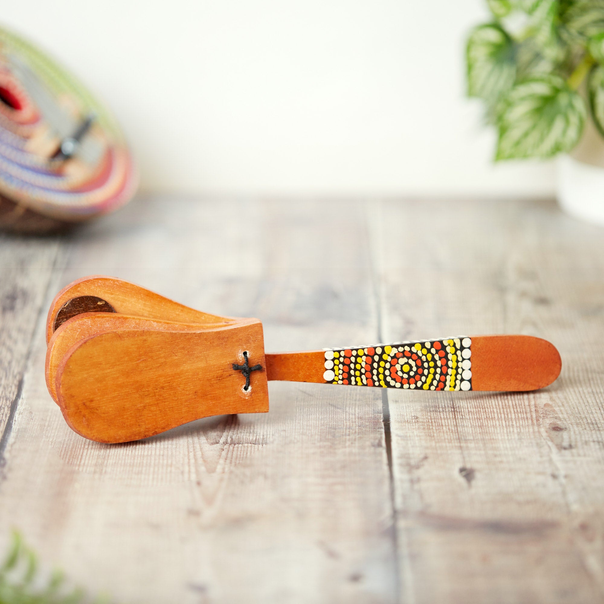 hand painted wooden castanets on stick