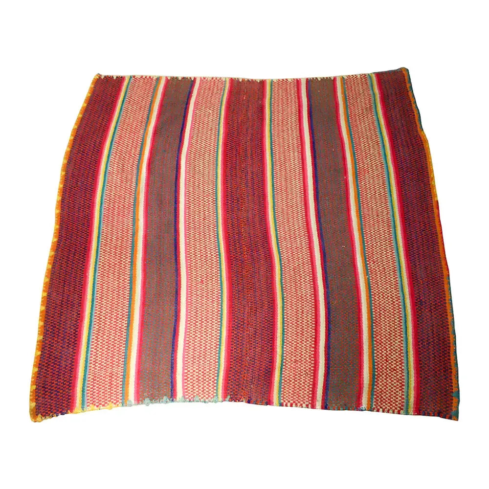 striped red and orange peruvian rug