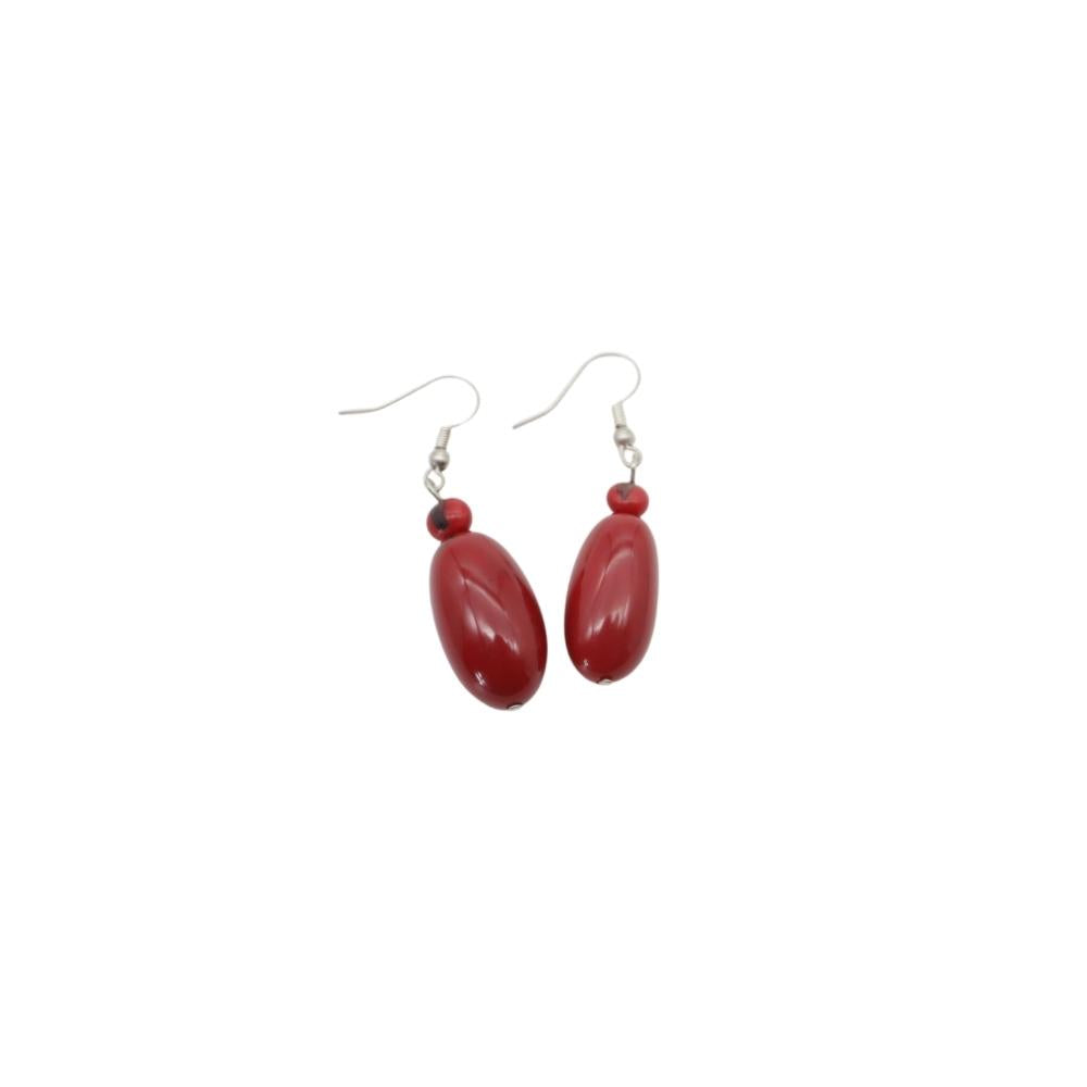 pair of red tagua seed earrings 