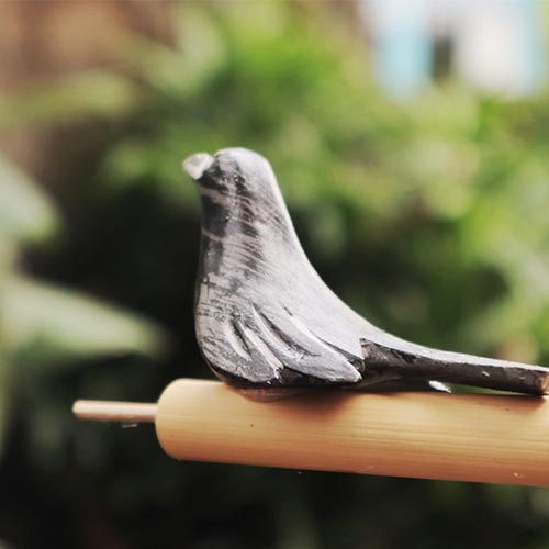 grey bird bamboo whistle