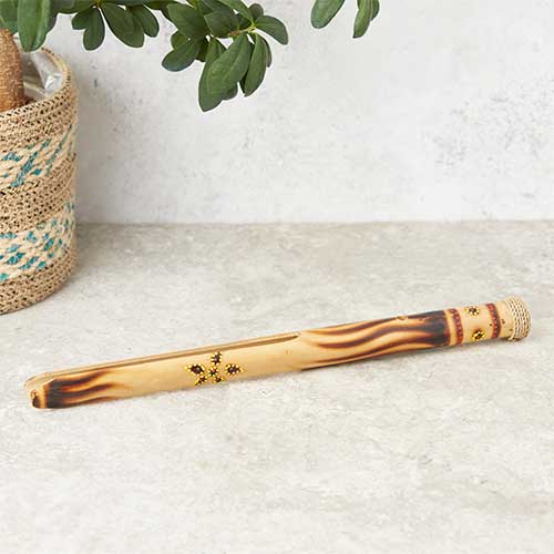 bamboo instrument with dotted painting