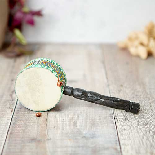 dot painted ontong drum with black handle