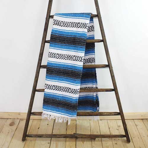 blue white and black stripped rug throw