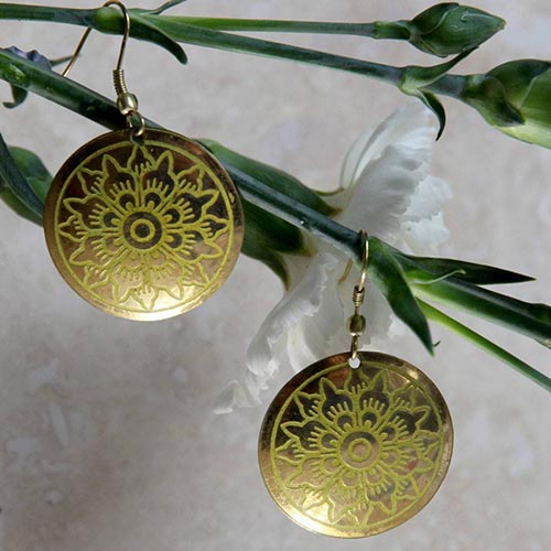 yellow brass yogi earrings pair on tree
