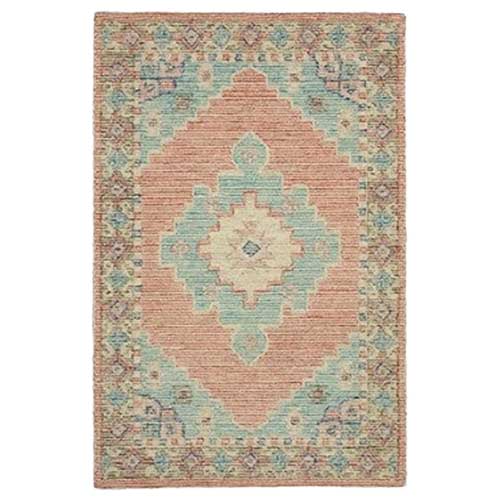 Close up of Indian diamond shape floral pink rug