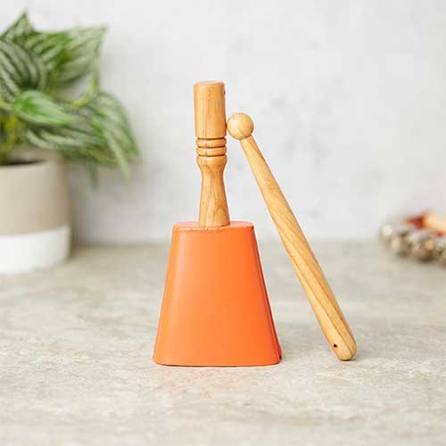 orange cowbell with beater