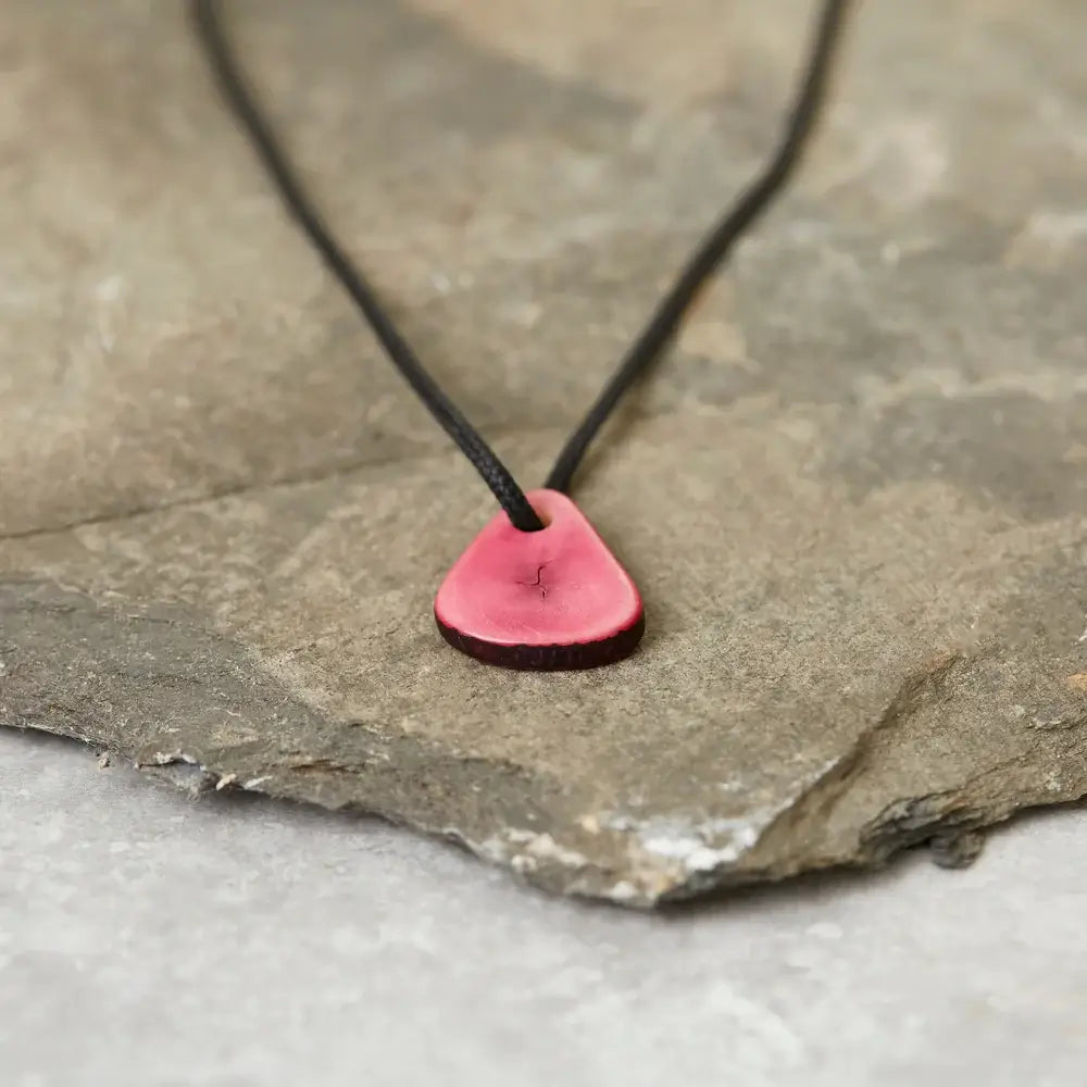 necklace with a pink tagua nut seed