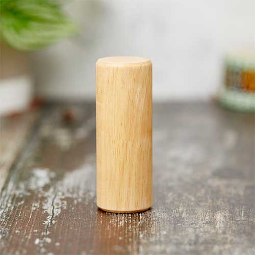Small solid wood cylinder shaker block
